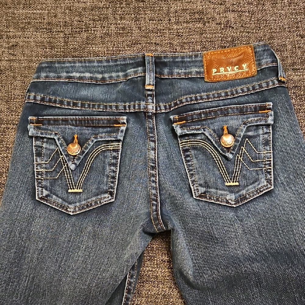 PRVCY Blue Flare & Low Rise Jeans with Stylish Stitching